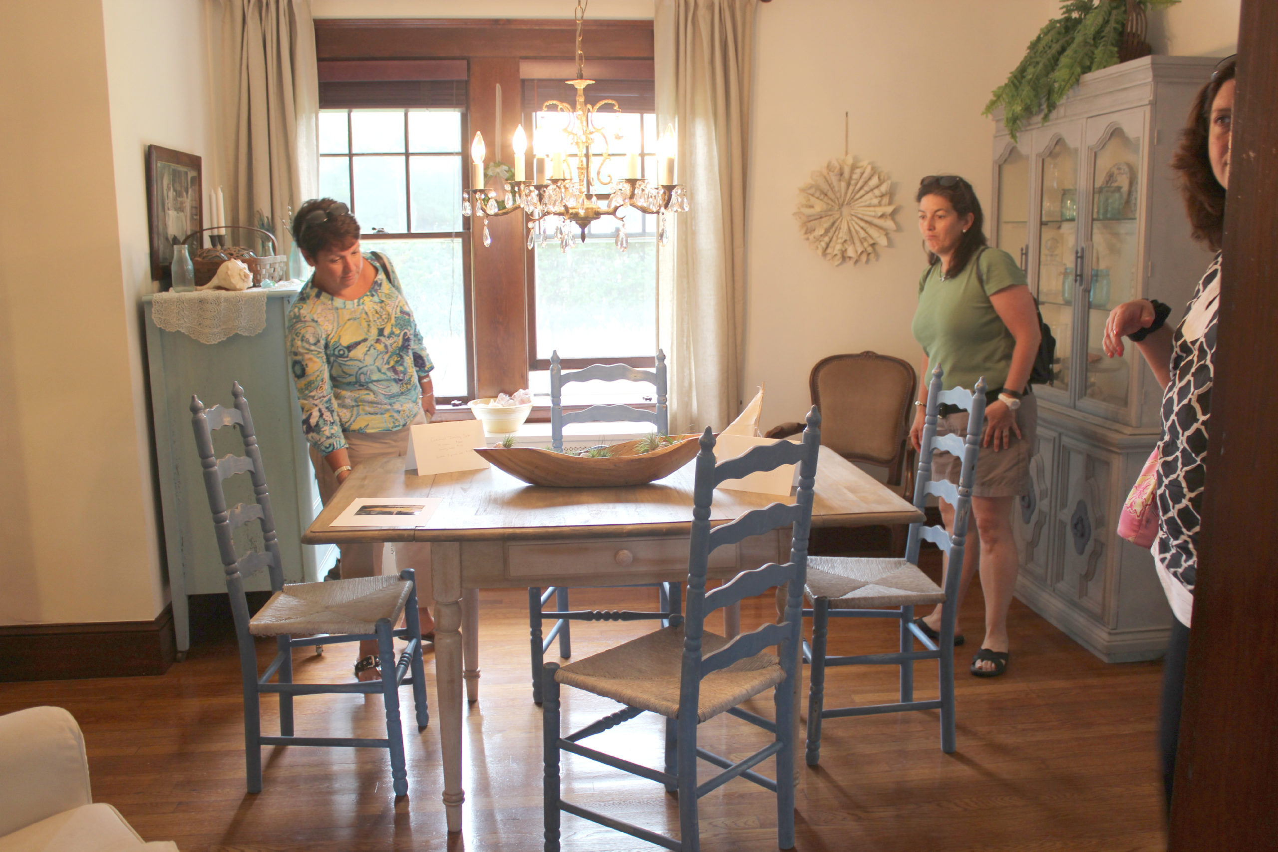 three people in dining room