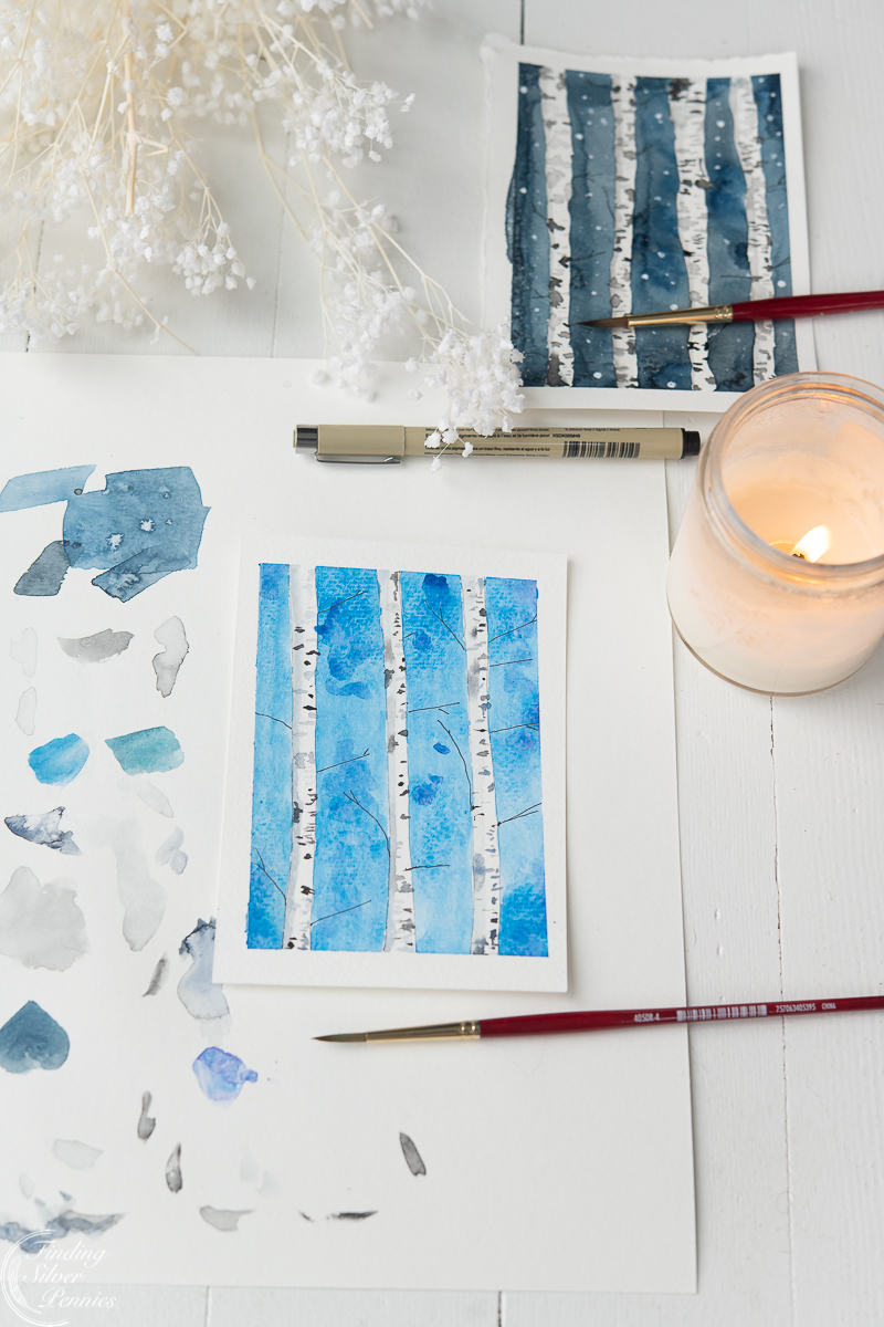 Birch Tree paintings with scrap paper, candle, and painting materials