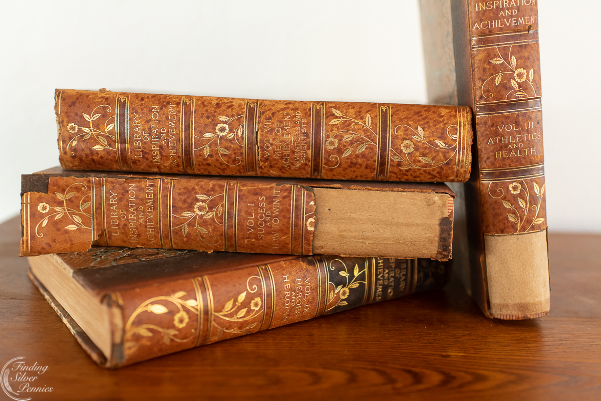 Cabinet top with stack of books